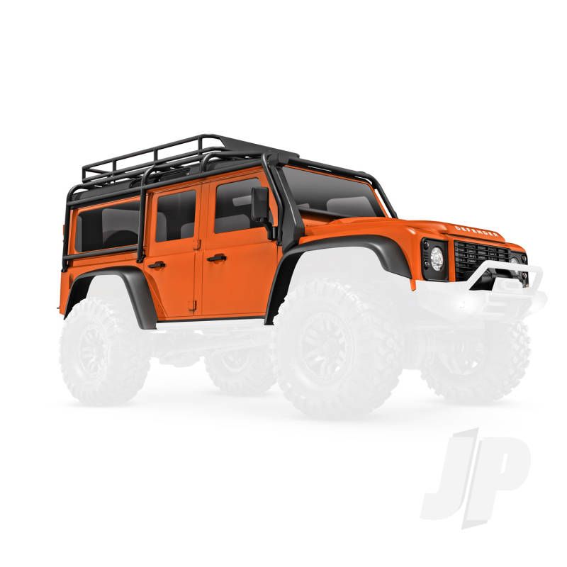 Traxxas Body, Land Rover Defender, Complete, Orange (Includes Grille, Side Mirrors, Door Handles, Fender Flares, Fuel Canisters, Jack, Spare Tire Mount, &amp; Clipless Mounting) (Requires #9734 Front &amp; Rear Bumpers) (TRX9712-ORNG)